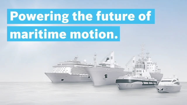 四艘大小各异的船只并排停泊在“Powering the future of maritime motion”这一标语下方