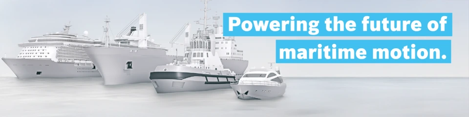 四艘大小各异的船只并排停泊在“Powering the future of maritime motion”这一标语下方
